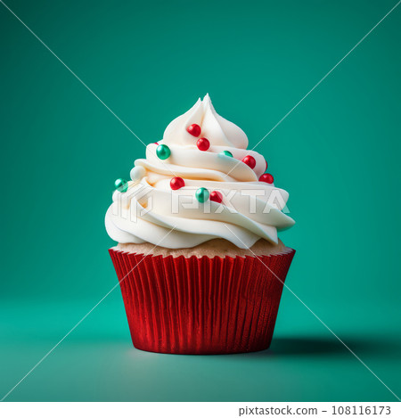 Christmas cupcake with a Christmas tree decoration 108116173