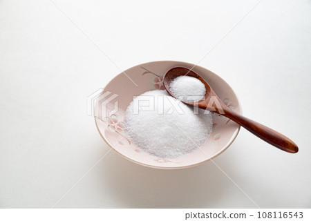 salt and wooden spoon 108116543