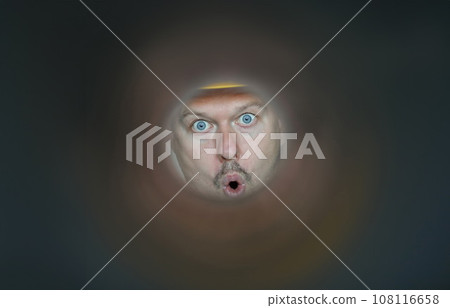 Man on his face uses facial expressions surprise Man on his face uses facial expressions surprise 108116658