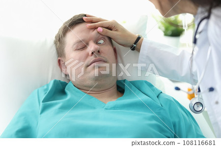 Doctor opens his eyes to patient unconscious clinic 108116681
