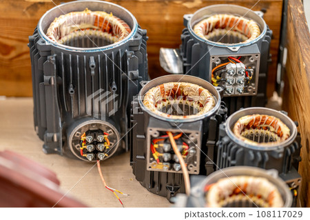 details of the electric motor in the wooden case in the factory 108117029