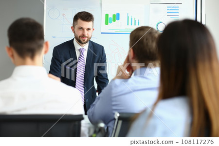 Smiling businessman and team conference 108117276