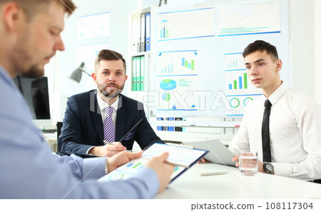 Witty people sitting in office Witty people sitting in office 108117304