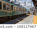 Enoden train stopping at the station 108117467
