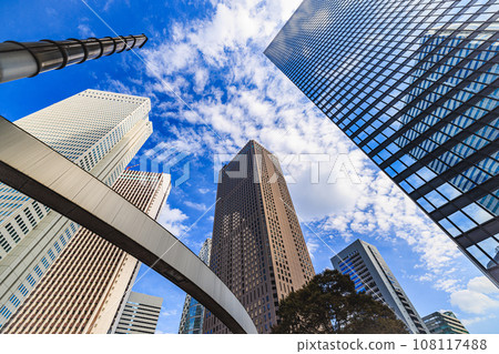 A skyscraper rising in the blue sky A skyscraper rising in the blue sky 108117488