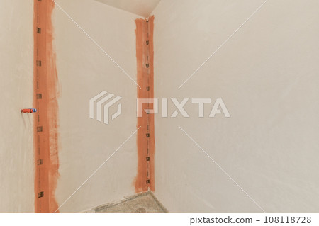 a bathroom being remodeled and ready for reurrectionments to be installed on the wall in the shower room a bathroom being remodeled and ready for reurrectionments to be installed on the wall in the shower room 108118728