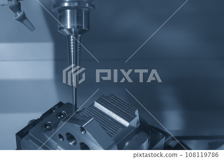 The 5-axis CNC milling machine cutting the automotive parts with ball end mill tool. The 5-axis CNC milling machine cutting the automotive parts with ball end mill tool. 108119786