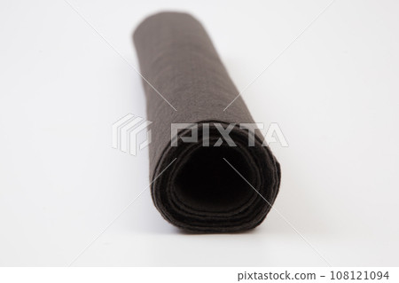 Roll of gray Thick fabric on the white background. Roll of gray Thick fabric on the white background. 108121094