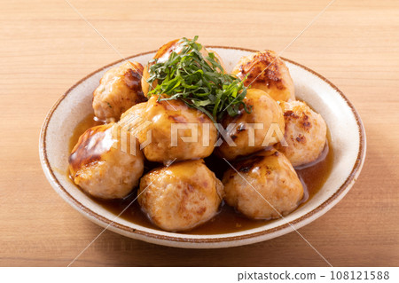 Chicken meatballs with sweet and sour sauce 108121588