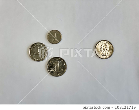 US quarter dollar coin vs one yuan, one dirham and one shekel. High quality photo 108121719