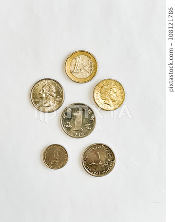 A set of coins on white background. High quality photo A set of coins on white background. High quality photo 108121786