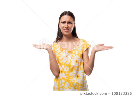 young stylish brunette woman sends doubts and is perplexed young stylish brunette woman sends doubts and is perplexed 108123386