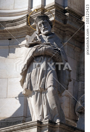 Statue of Saint John of Nepomuk, detail of Holy Trinity plague column in front of Matthias Church in Budapest, Hungary 108123423