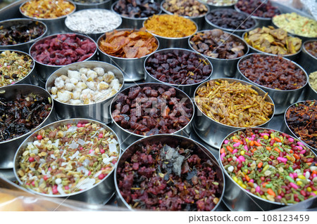 Different spices and herbs in metal bowls on a street market in Kolkata, West Bengal, India 108123459