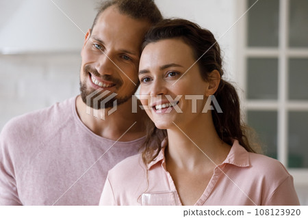 Happy cheerful millennial married family couple of new tenants 108123920