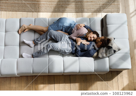 Happy sweet couple enjoying closeness, peaceful leisure time Happy sweet couple enjoying closeness, peaceful leisure time 108123962