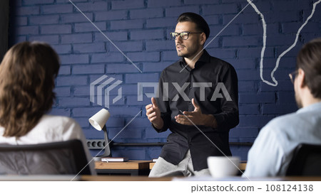 Project leader lead corporate meeting with colleagues 108124138