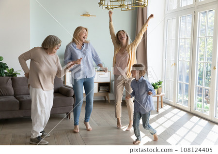 Happy women of four female generations enjoying family party, 108124405