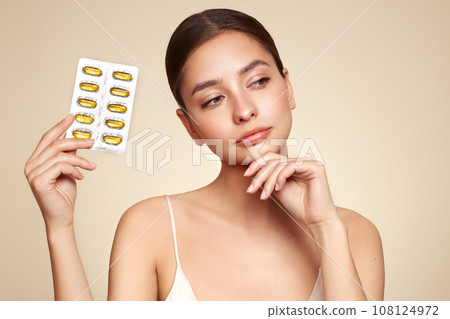 Beautiful Girl With Pill With Cod Liver Oil Omega-3 108124972