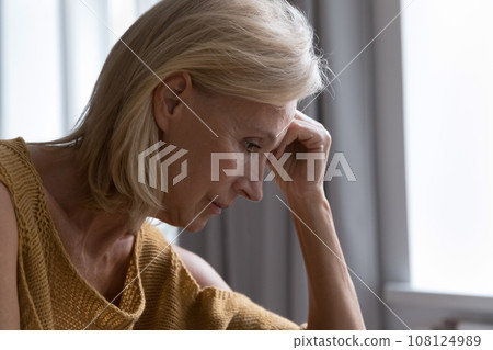 Sad thoughtful lonely elderly lady suffering from apathy, depression Sad thoughtful lonely elderly lady suffering from apathy, depression 108124989