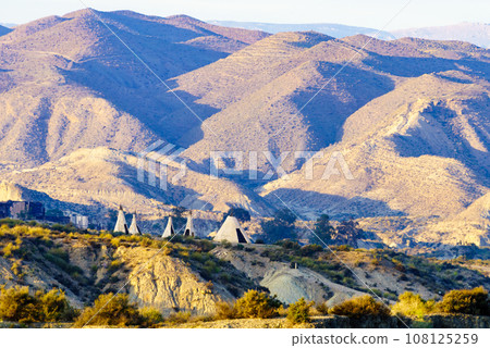 Tabernas desert and Indian village wigwams at Western Leone, Spain 108125259