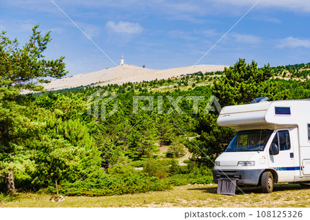 Caravan in mountains. Mont Ventoux in the distance. Provance Caravan in mountains. Mont Ventoux in the distance. Provance 108125326