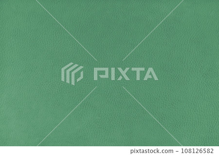 Texture background of green velours fabric textured like leather surface Texture background of green velours fabric textured like leather surface 108126582