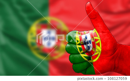 thumbs up in approval with the Portuguese flag painted thumbs up in approval with the Portuguese flag painted 108127059
