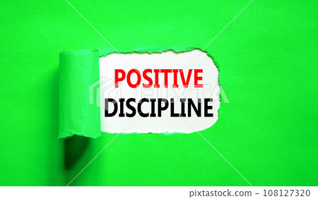 Positive discipline symbol. Concept words Positive discipline on beautiful white paper. Beautiful green paper background. Business psychology positive discipline concept. Copy space. Positive discipline symbol. Concept words Positive discipline on beautiful white paper. Beautiful green paper background. Business psychology positive discipline concept. Copy space. 108127320