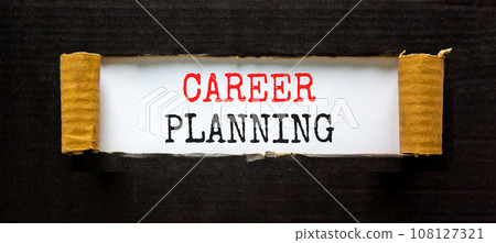 Career planning symbol. Concept words Career planning on beautiful white paper. Beautiful black table black background. Business, motivational career planning concept. Copy space. Career planning symbol. Concept words Career planning on beautiful white paper. Beautiful black table black background. Business, motivational career planning concept. Copy space. 108127321
