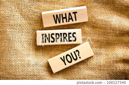 What inspires you symbol. Concept words What inspires you on wooden block. Beautiful canvas table canvas background. Business motivational what inspires you concept. Copy space. What inspires you symbol. Concept words What inspires you on wooden block. Beautiful canvas table canvas background. Business motivational what inspires you concept. Copy space. 108127340