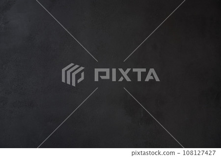 Black wall background made of natural brushstroke, textured old cement or stone. Concrete texture as a Horror and Halloween concept. High quality photo 108127427