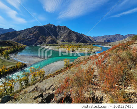 The confluence of two rivers, Katun and Chuya, the famous tourist spot in the Altai mountains, Autumn in Siberia, Russia The confluence of two rivers, Katun and Chuya, the famous tourist spot in the Altai mountains, Autumn in Siberia, Russia 108127435