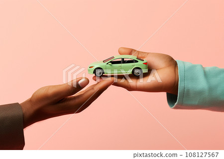 Hand holding a miniature car model. Car buying, investment, insurance, protection and savings concept. Buying or selling a car, leasing business, service and repair. AI generated Hand holding a miniature car model. Car buying, investment, insurance, protection and savings concept. Buying or selling a car, leasing business, service and repair. AI generated 108127567