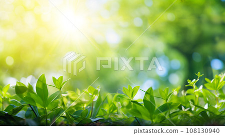 Green leaves against blurred sunny background, ecology concept - generative AI 108130940