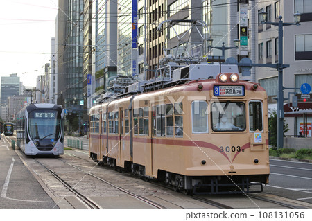Hiroshima Electric Railway Tram 42 Type 3000 No. 3003 Kamiyacho West - In front of the Atomic Bomb Dome Hiroshima Electric Railway Tram 42 Type 3000 No. 3003 Kamiyacho West - In front of the Atomic Bomb Dome 108131056