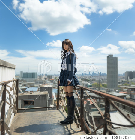 A high school girl in a uniform looking down coolly on a sunny balcony A high school girl in a uniform looking down coolly on a sunny balcony 108132055