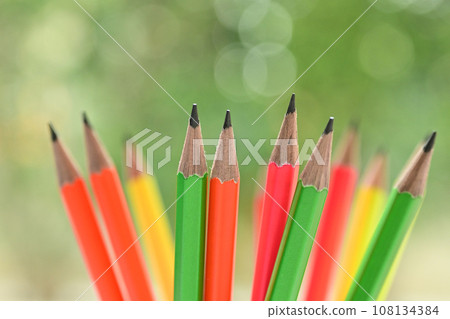 group of colourful sharp pencil on blur green nature background with bokeh group of colourful sharp pencil on blur green nature background with bokeh 108134384
