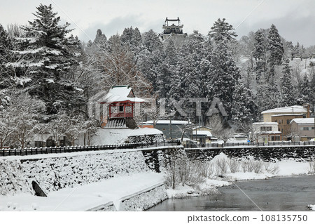 A landscape with a castle and bell hall in Yokote City, a town with mountains and rivers A landscape with a castle and bell hall in Yokote City, a town with mountains and rivers 108135750