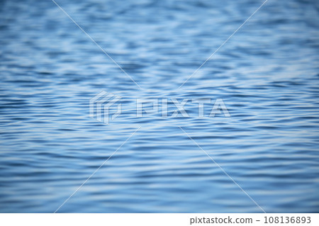 Closeup seascape surface of blue sea water with small ripple waves. 108136893