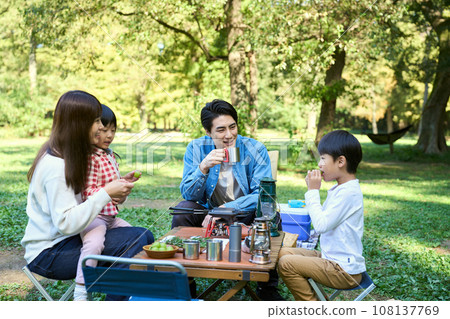 Family enjoying camping Family enjoying camping 108137769