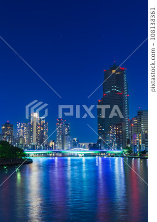 Illuminated Tsukuda Ohashi Bridge and cityscape spanning the Sumida River Illuminated Tsukuda Ohashi Bridge and cityscape spanning the Sumida River 108138361