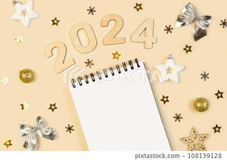 New Year Aims 2024. To Do List. Empty Notebook at the Desk with Holiday Decoration. Top view. Creating Plan, Resolution. New Life, Start Up, Beginning Concept. Business ideas. Goals, action, checklist New Year Aims 2024. To Do List. Empty Notebook at the Desk with Holiday Decoration. Top view. Creating Plan, Resolution. New Life, Start Up, Beginning Concept. Business ideas. Goals, action, checklist 108139128