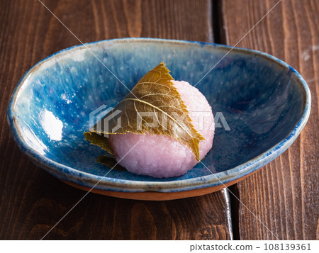 Sakuramochi wrapped in salted cherry blossom leaves. Domyoji style. Sakuramochi wrapped in salted cherry blossom leaves. Domyoji style. 108139361