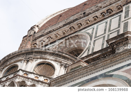 Details of the exterior of the di Santa Maria del Fiore or Cathedral of Saint Mary of the Flower - the main church of Florence, Tuscany, Italy. 108139988