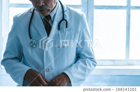 A man wearing a white suit A man wearing a white suit 108141101