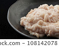 Raw pollack milt on a black plate 108142078