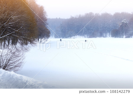 Pond and forest under snow. Winter fishing 108142279