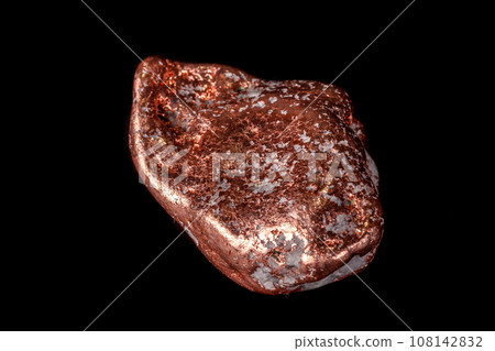 Macro mineral stone of a copper nugget on a microcline on a black background 108142832