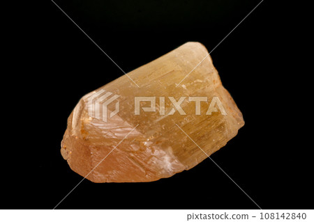 Macro mineral stone Spodumene on a black background Macro mineral stone Spodumene on a black background 108142840